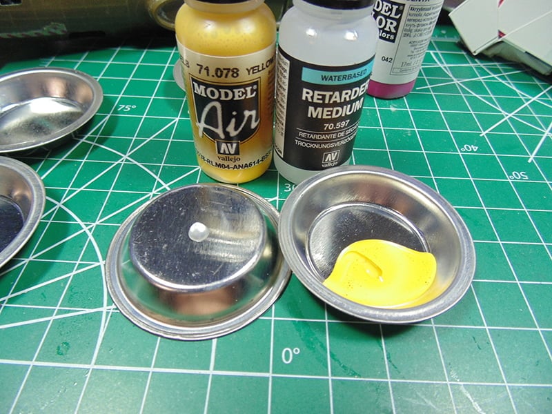 I am trying to airbrush vallejo acrylics, but the spray is not