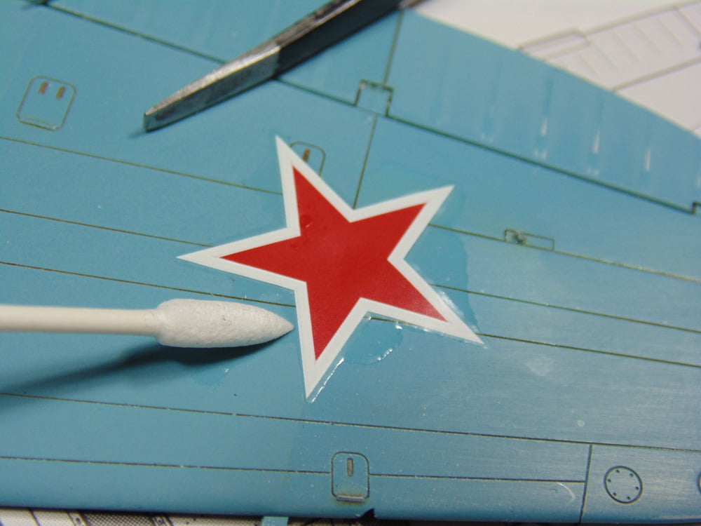 Red Star with Swab and Tweezers on Blue Part