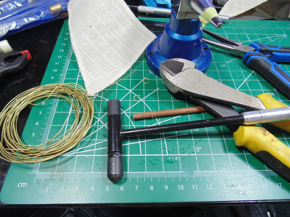 Wire roll and tools with sail