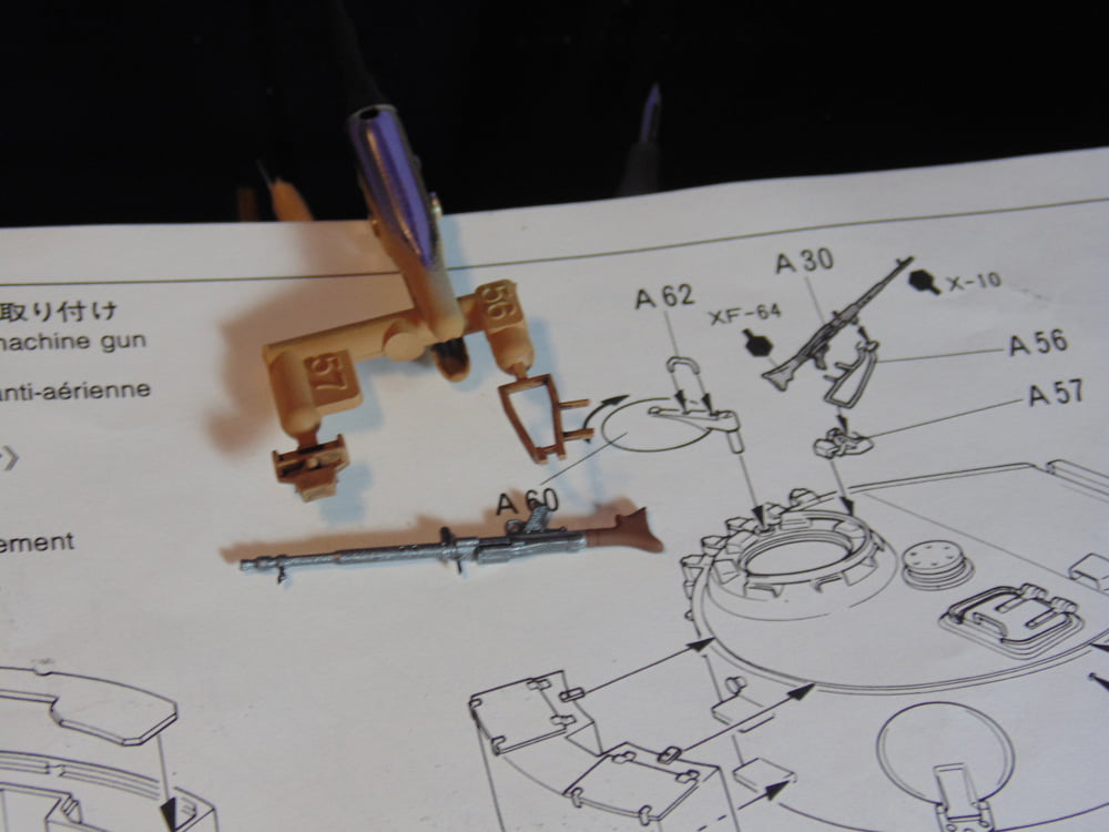 Machine gun parts on instruction page