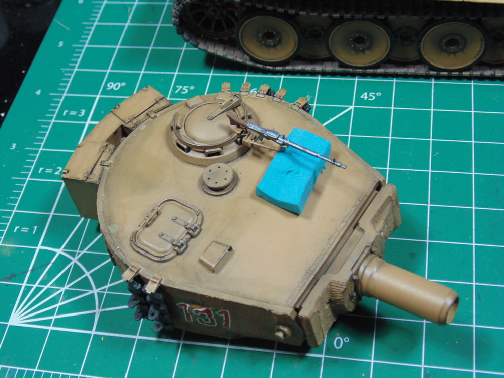 Turret top with blue foam bit under gun