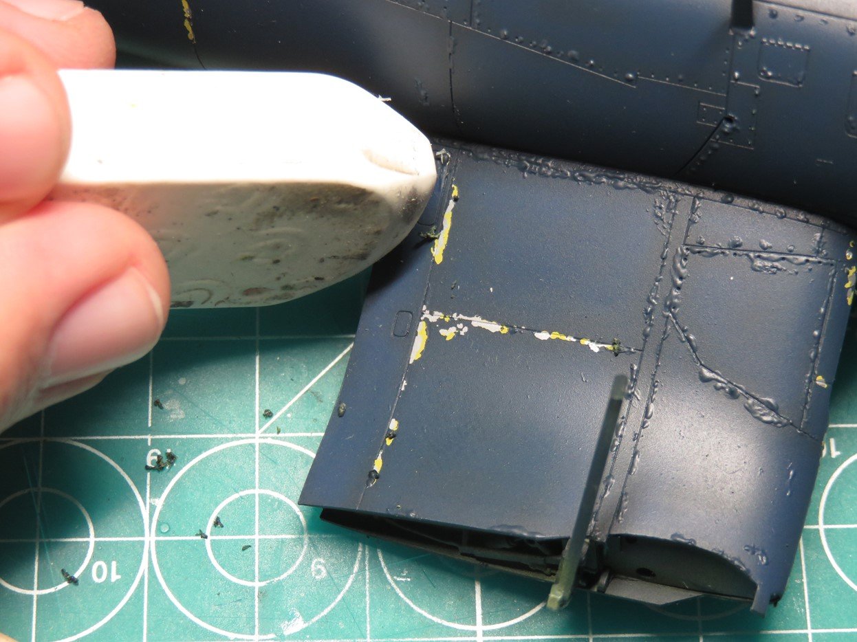 Removing Masking Film with Rubber Eraser